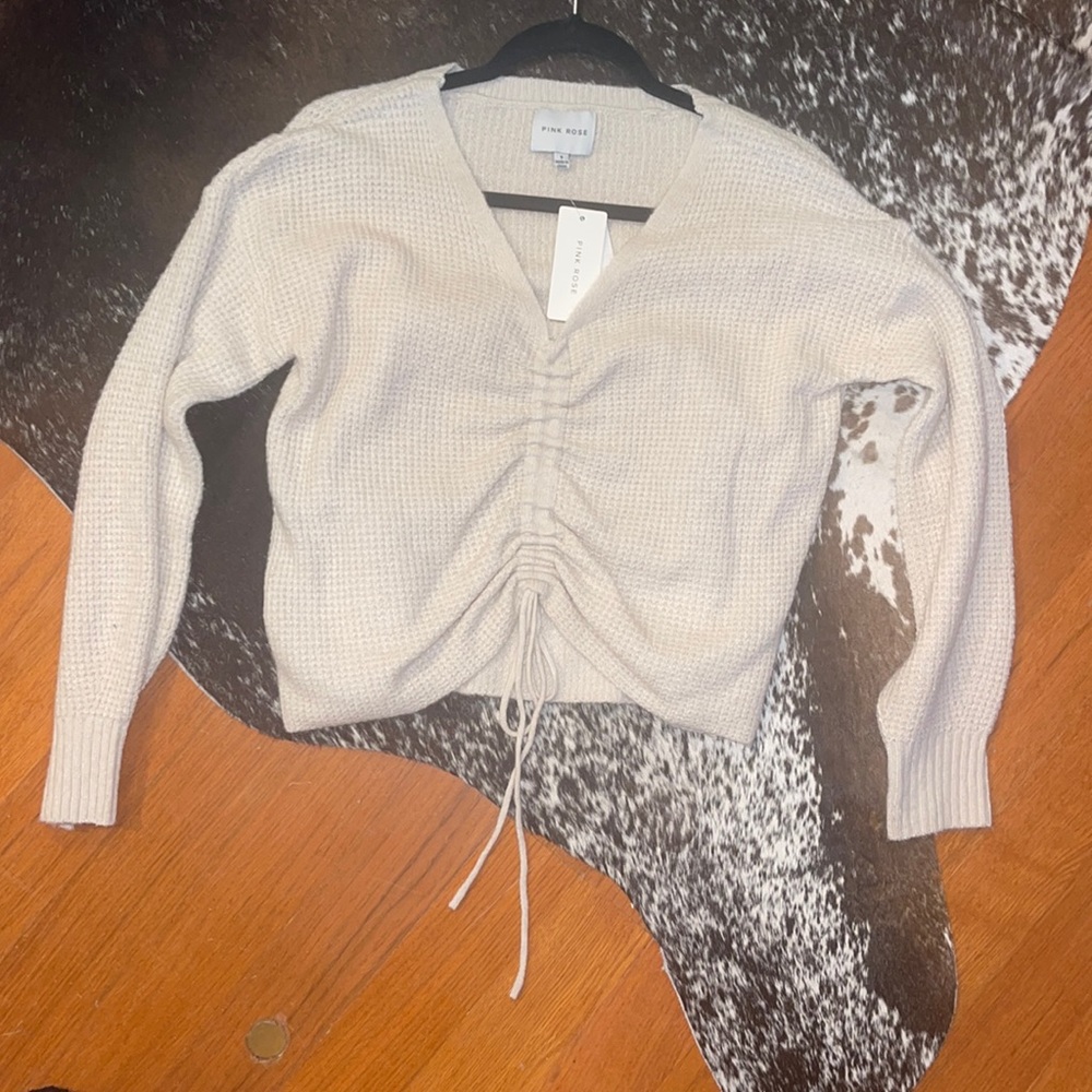 Cinch front sweater